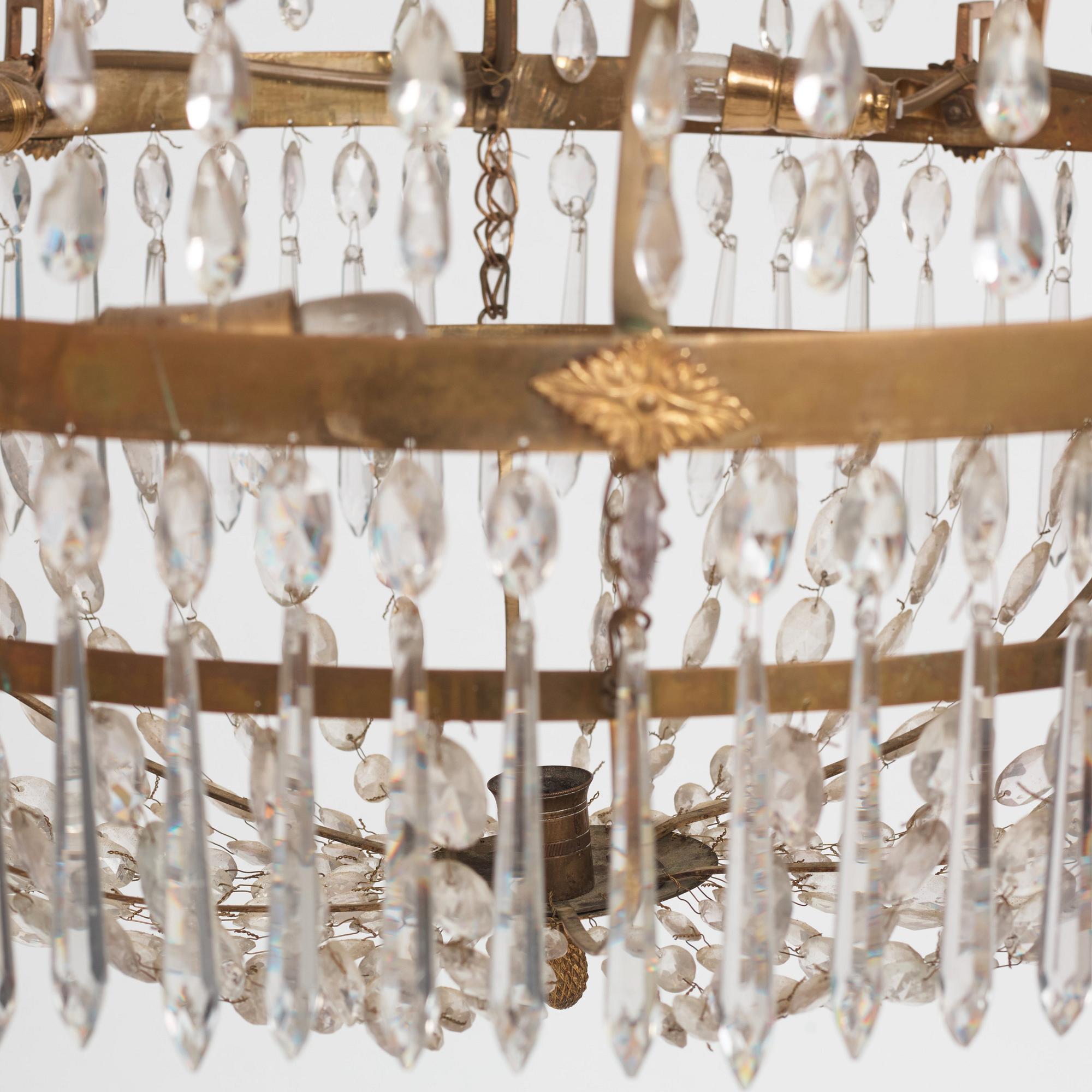 A late Gustavian gilt brass and cut glass seven-light chandelier, Stockholm, late 18th century.