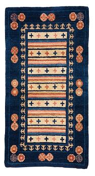 283. A rug, semi-antique Baotou, ca 108,5 x 56,5 cm.