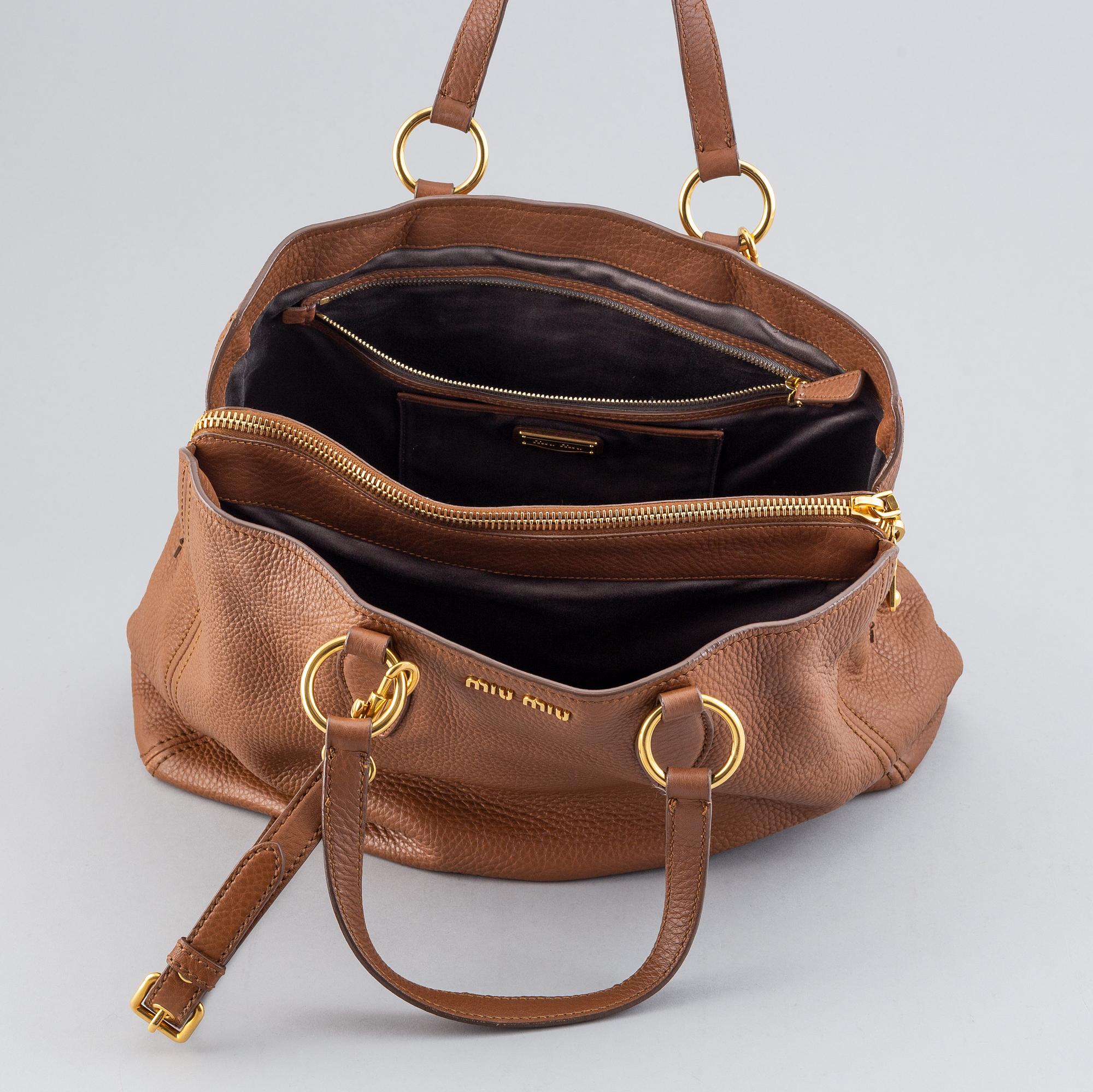 Miu Miu, a leather bag.