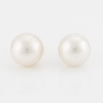 Earrings with cultured South Sea pearls.