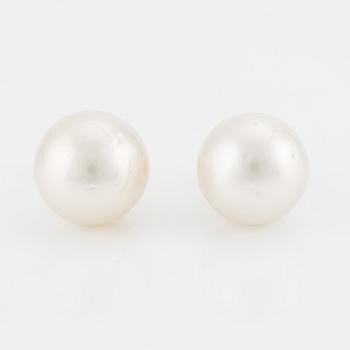 Earrings with cultured South Sea pearls.