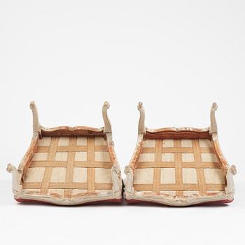 A large pair of Swedish Rococo armchairs in the manner of O Höglander (1750-1765).