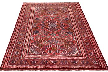 A carpet, Mahabad, c. 308 x 208 cm.