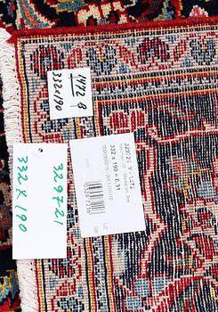 A Kashan carpet, c. 332 x 190 cm.