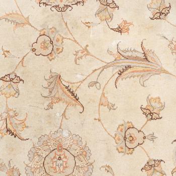 A Tabriz Carpet, circa 243 x 165 cm.