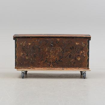 a Swedish folk art chest with the letters A.E.D and dated 1793.