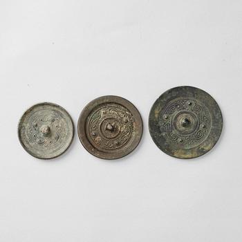 Three bronze mirrors, late Western Han dynasty, circa 100 B.C.