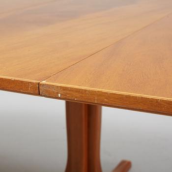 Josef Frank, a mahogany veneered model 771 dining table, Svenskt Tenn, post 1985.