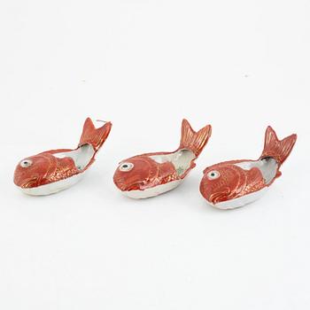 A set of three iron red 'carp-dishes', Japan, first part of the 20th century.