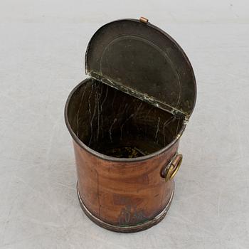 A copper water container, around the year 1900.