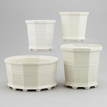 A set of four white glazed "Waldemarsudde" flower pots, Gustavsberg, Sweden, 20th Century.