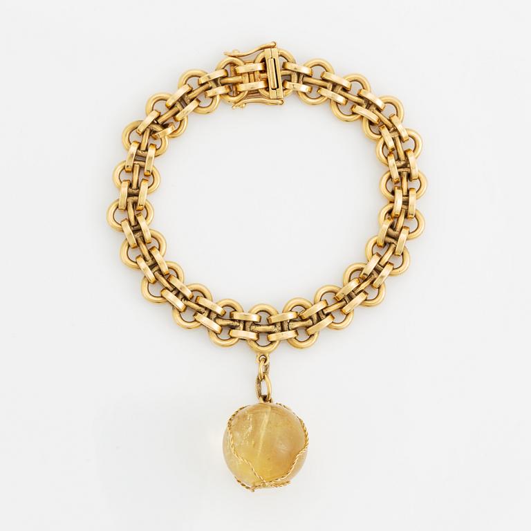 Claës E. Giertta, 18K gold bracelet with citrine charm.