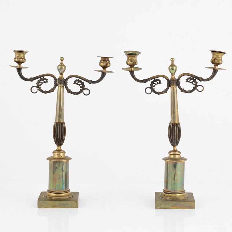 A pair of Empire style candelabra, early 20th Century.