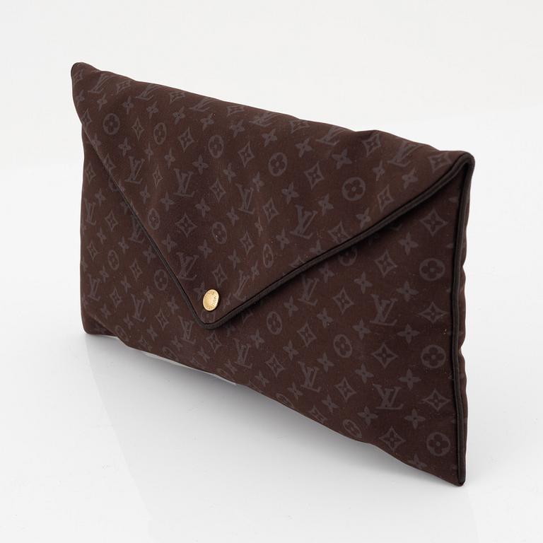 Louis Vuitton, a monogram "Trousse kit de voyage' travel kit with inflatible pillow and eye mask.