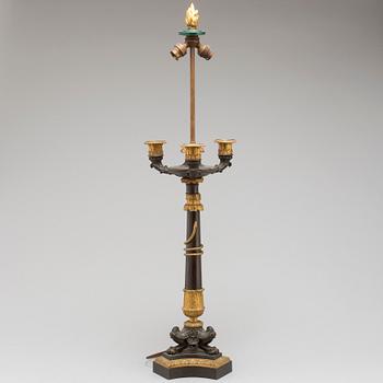 A first half of the 19th century bronze table lamp.