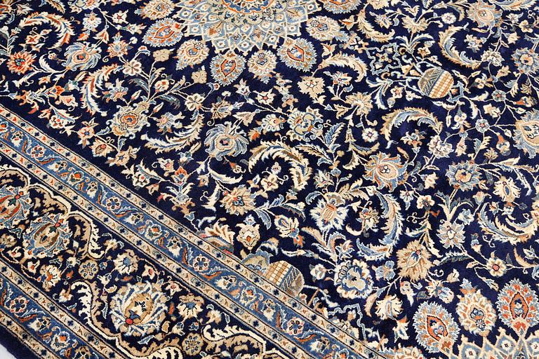 A Kashmar carpet, ca 340 x 253 cm.