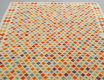 A carpet, kilim, ca 238 x 174 cm.