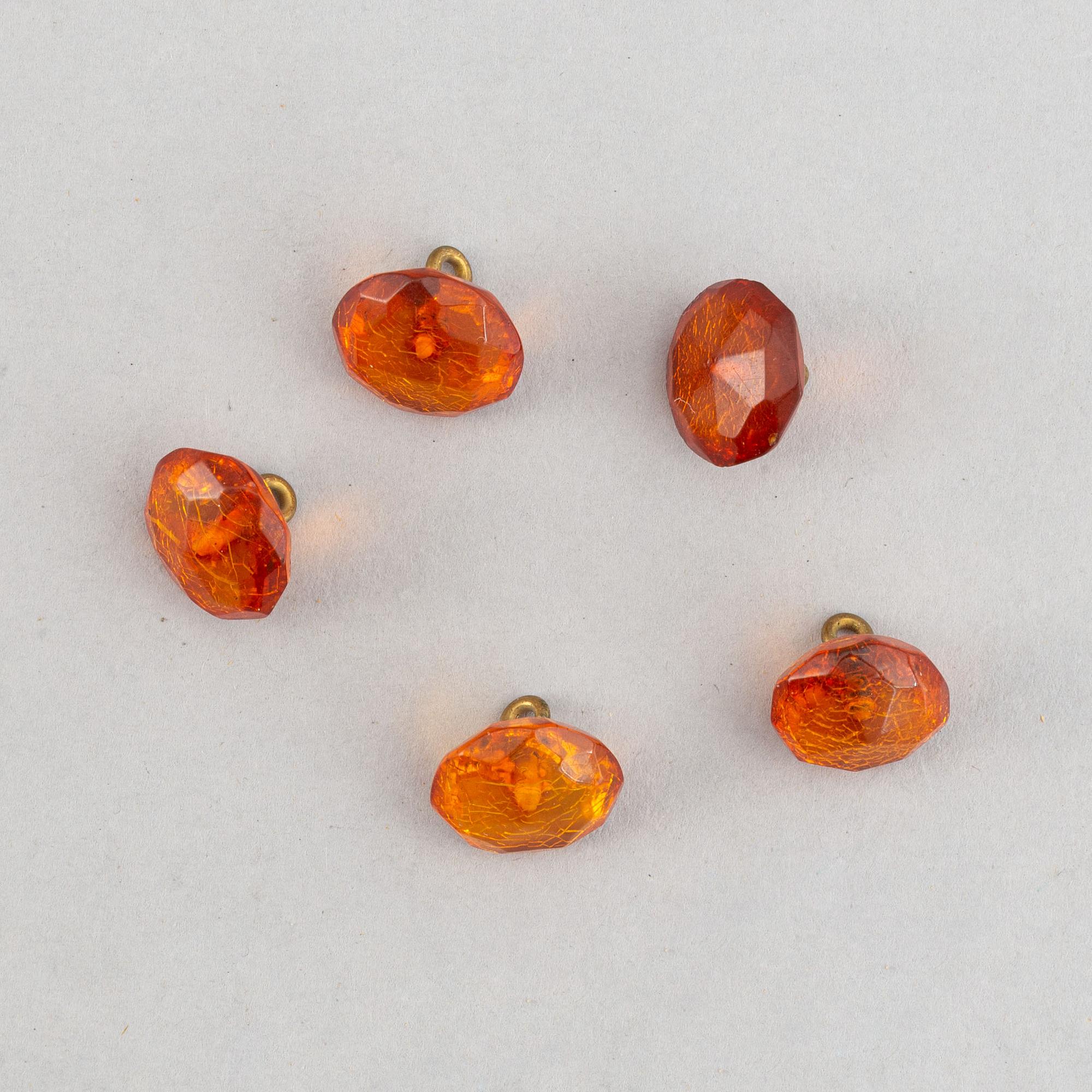 A group of amber objects, China, 20th Century. (14 small pieces).