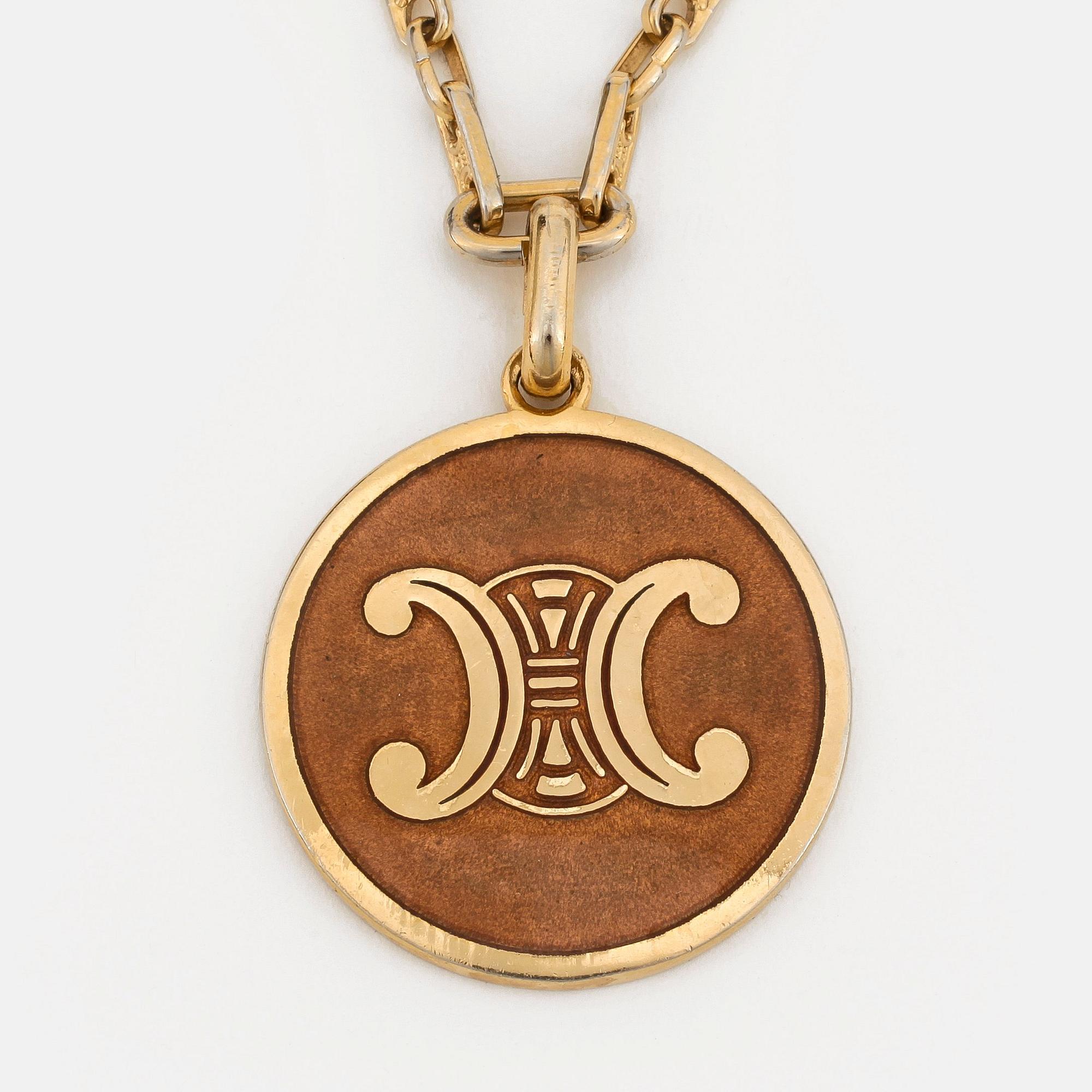 CÉLINE, a necklace.