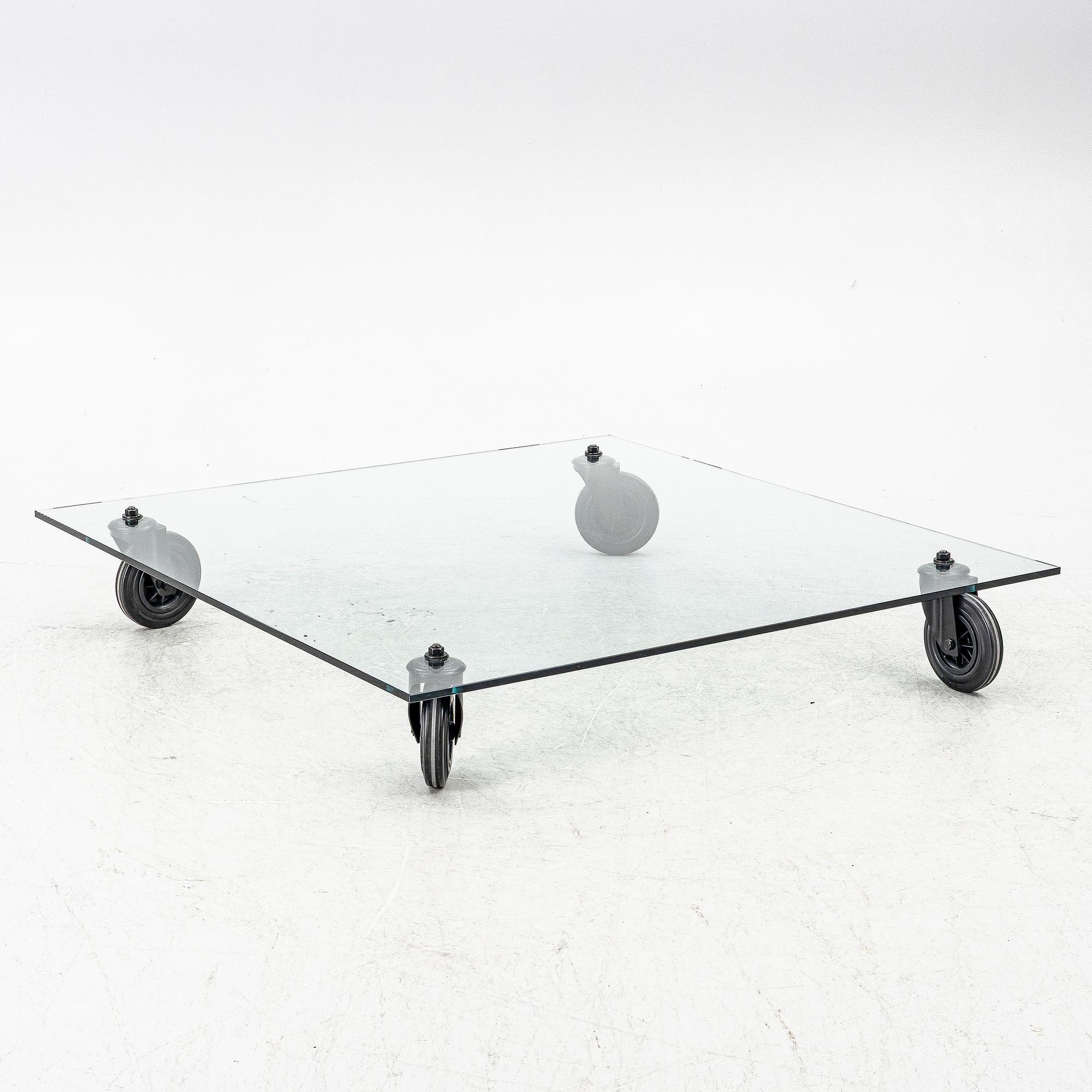 Gae Aulenti, Coffee table, “Tavolo con Ruote”, Fontana Arte, Italy, late 20th/early 21st century.