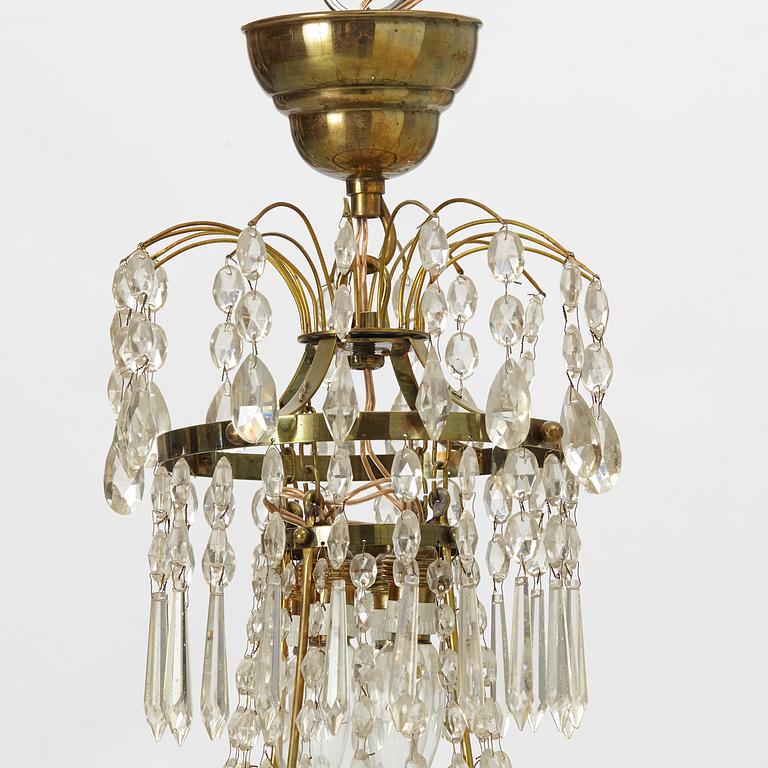 A four-branch Gustavian style chandelier, mid 20th century.