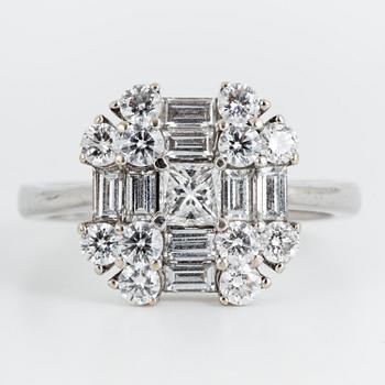 A ca 1.20 cts brilliant- princess- and baguette-cut diamond ring.