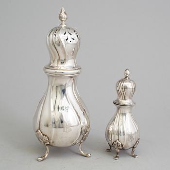 Two 20th century silver casters, one marked CG Hallberg, Stockholm 1938 and one with Swedish import marks.
