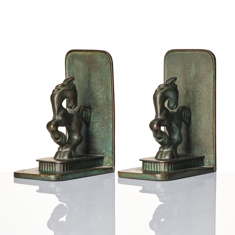 Carl-Einar Borgström, a pair of patinated bronze bookends, Ystad Brons, 1930-40s.