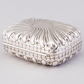 A hinged parcel-gilt soap case, London 1884.
