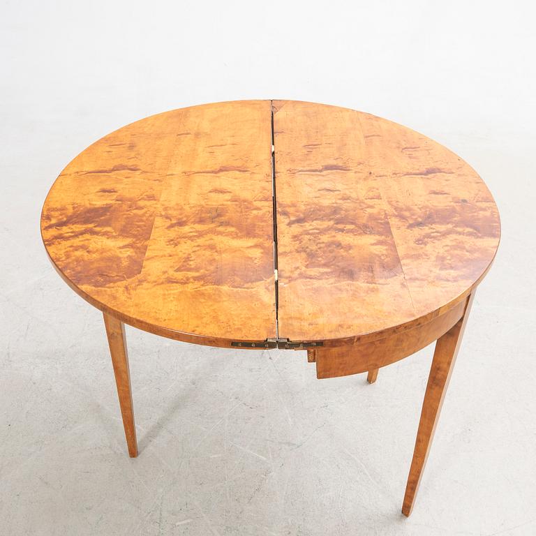 Half-moon table, 19th century.