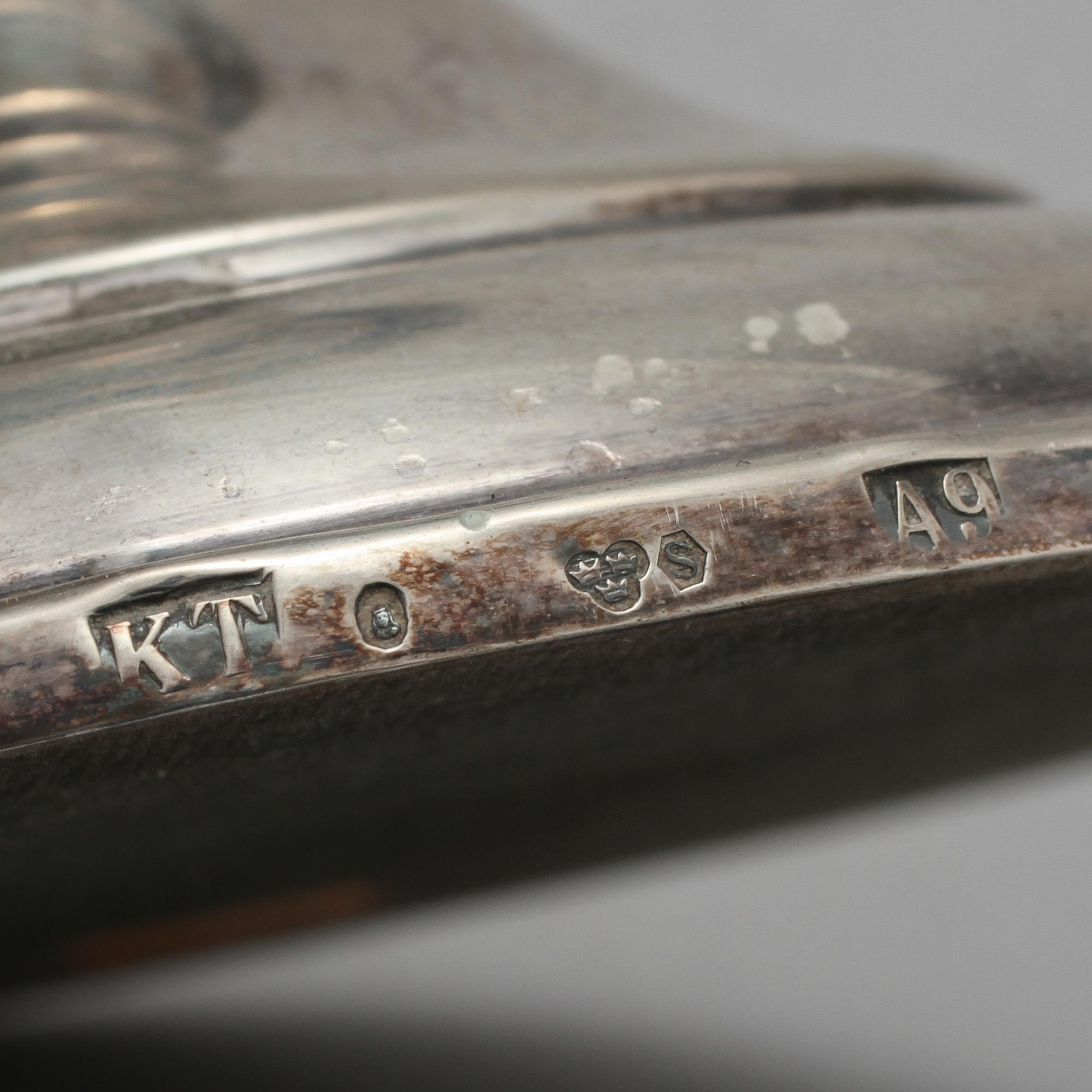 LJUSSTAKAR, 1 + 2, silver, importstämplad respektive K Torndals Juvelerare AB, Stockholm, 1951.