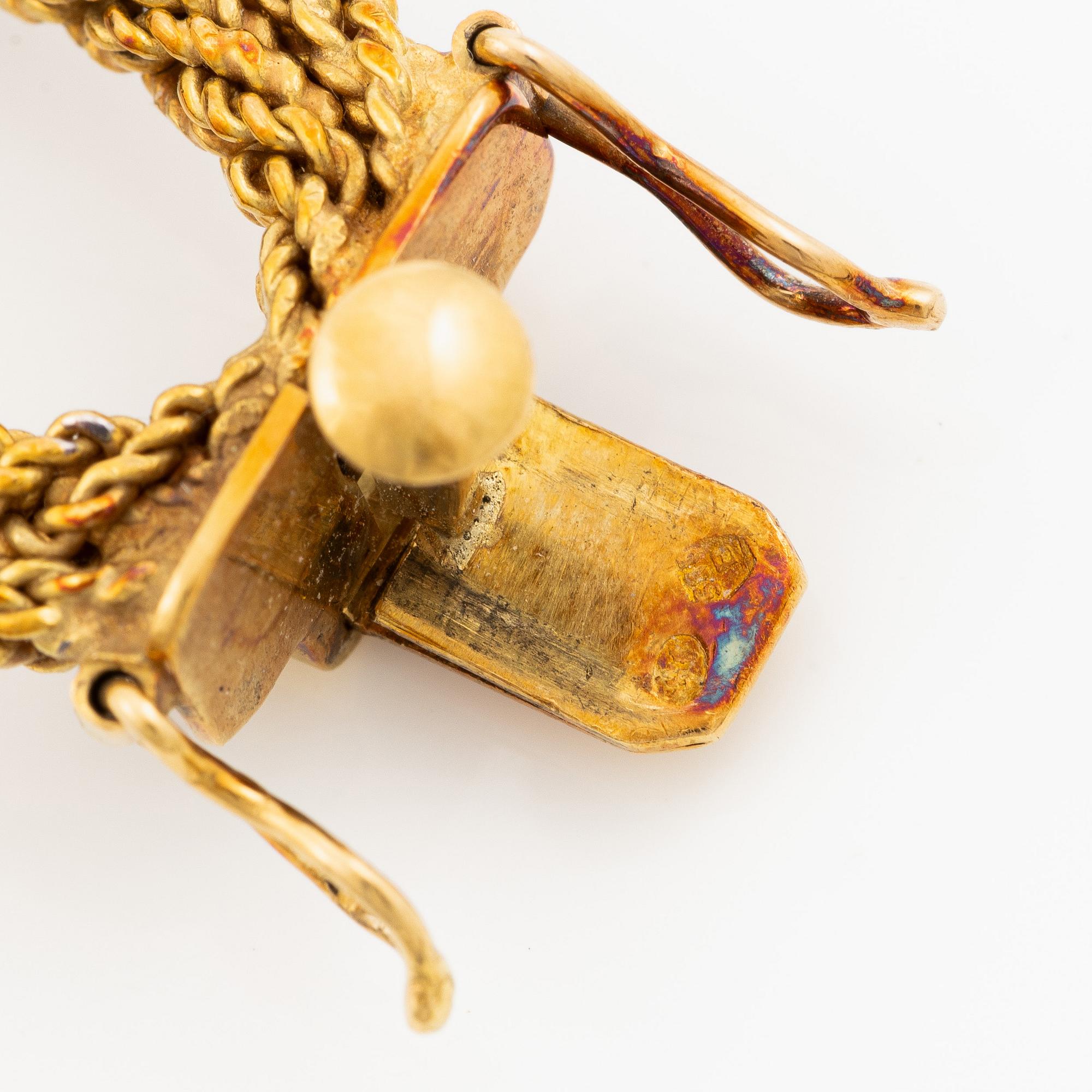 Armband 14K tvåfärgat guld i form av flätade ovala länkar, omkring ca 1950-70-tal.