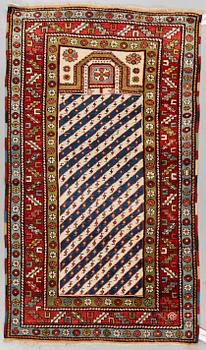 A RUG, a semi-antique Caucasian, a prayer rug, ca 160,5-165 x 96,5 cm (as well as 1 cm flat weave at the ends).