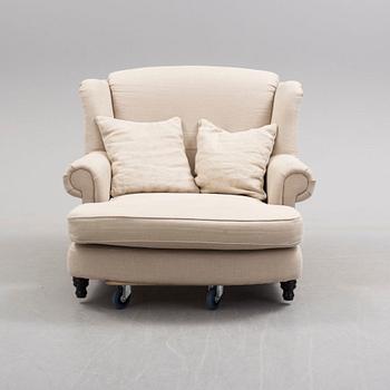 A 'Howard' wing-chair, 21st Century-.