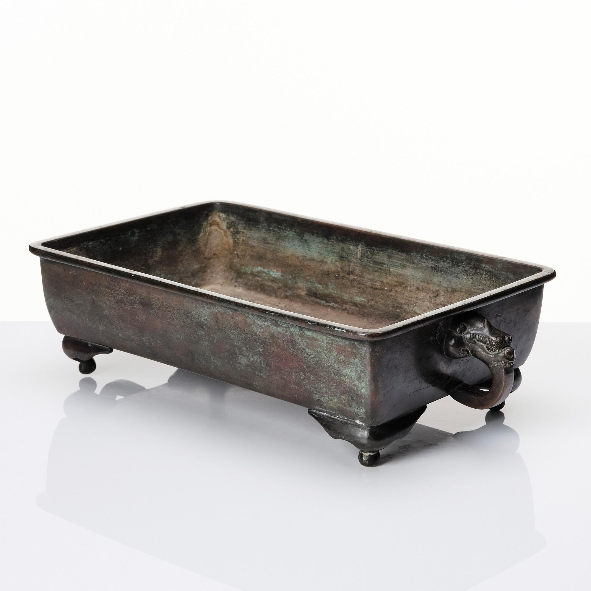 A Japanese bronze flower pot, Meiji period (1868-1912).