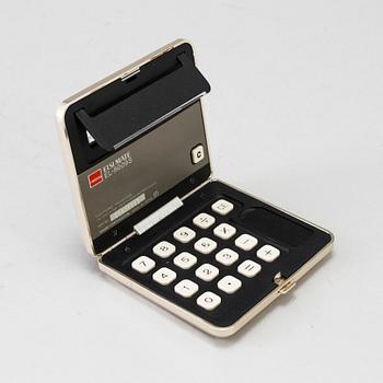 A silver calculator by Tiffany's and cuff link box in silver H.V.P & Co Birmingham 1887.