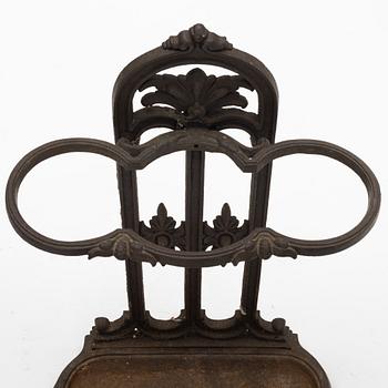 A cast iron umbrella stand, circa 1900.