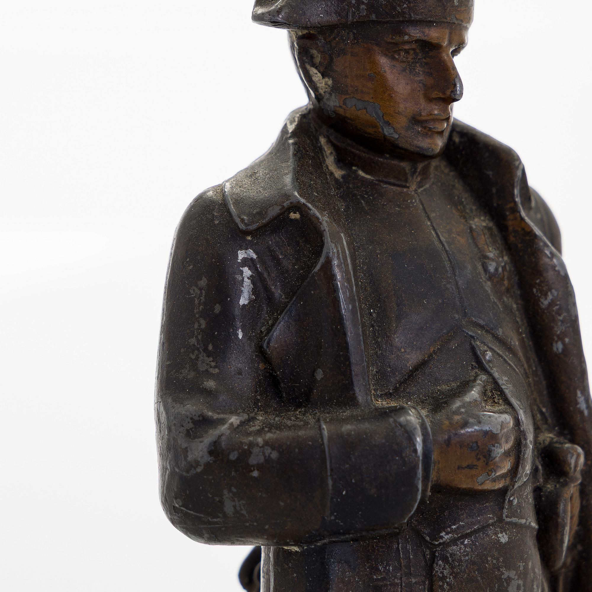 A 20th century patinated white metal sculpture.