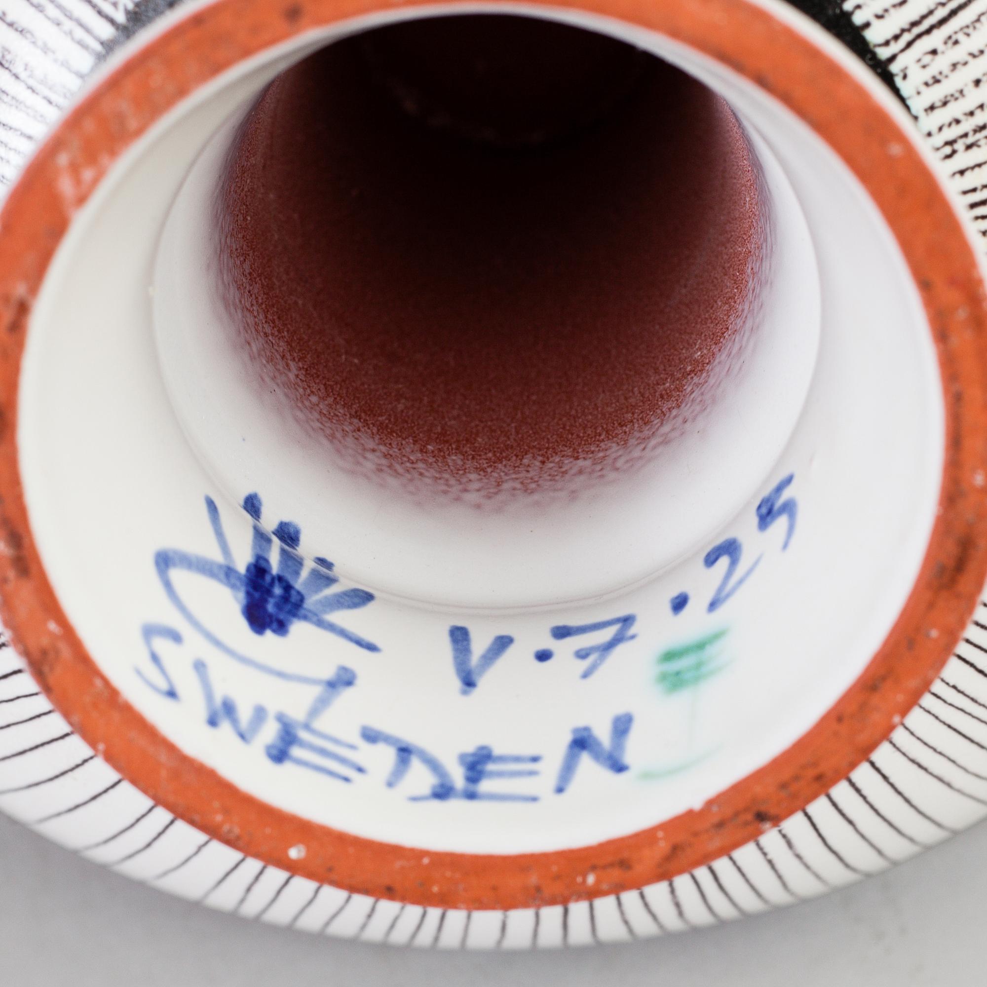 A Stig Lindberg faience candle-stick and  a bowl, 1940's.