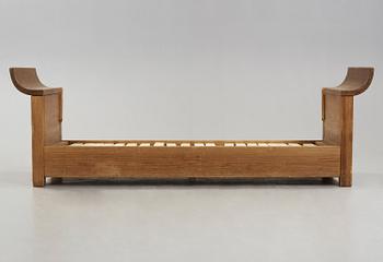 An Axel Einar Hjorth stained pine sofa 'Sandhamn', Nordiska Kompaniet 1933.