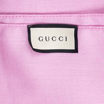 Gucci, a wool and silk mix "GG" jaquard shawl.