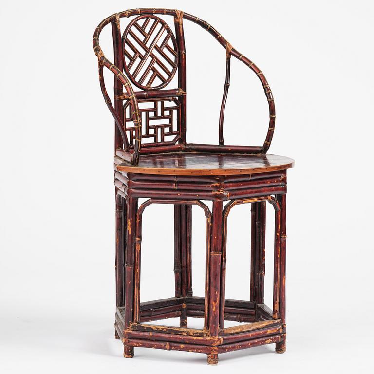 A Chinese bamboo horseshoeback armchair, late Qing dynasty.