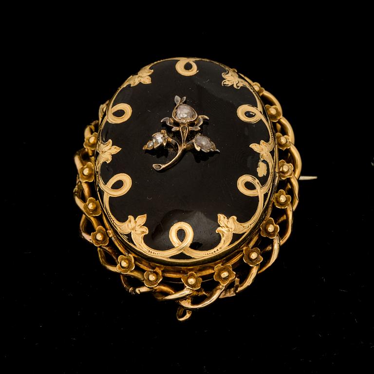 BROSCH/BERLOCK, 18K guld. Gustaf Adolf Cedergren, Stockholm, 1800-talets andra hälft.