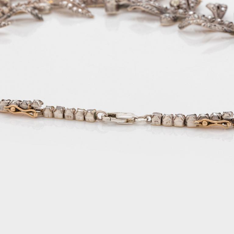 An old-, rose- and pear shaped diamond and probably natural saltwater pearl necklace.