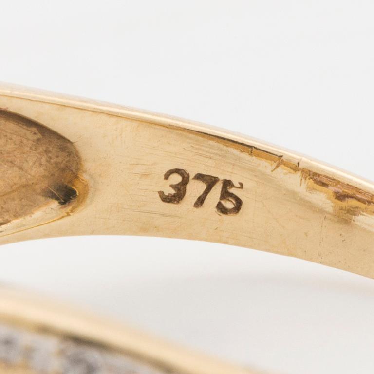 RING, med 16 briljantslipade diamanter samt fasettslipade rosa safirer.