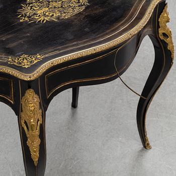 A Louis XV style table, early 20th Century.