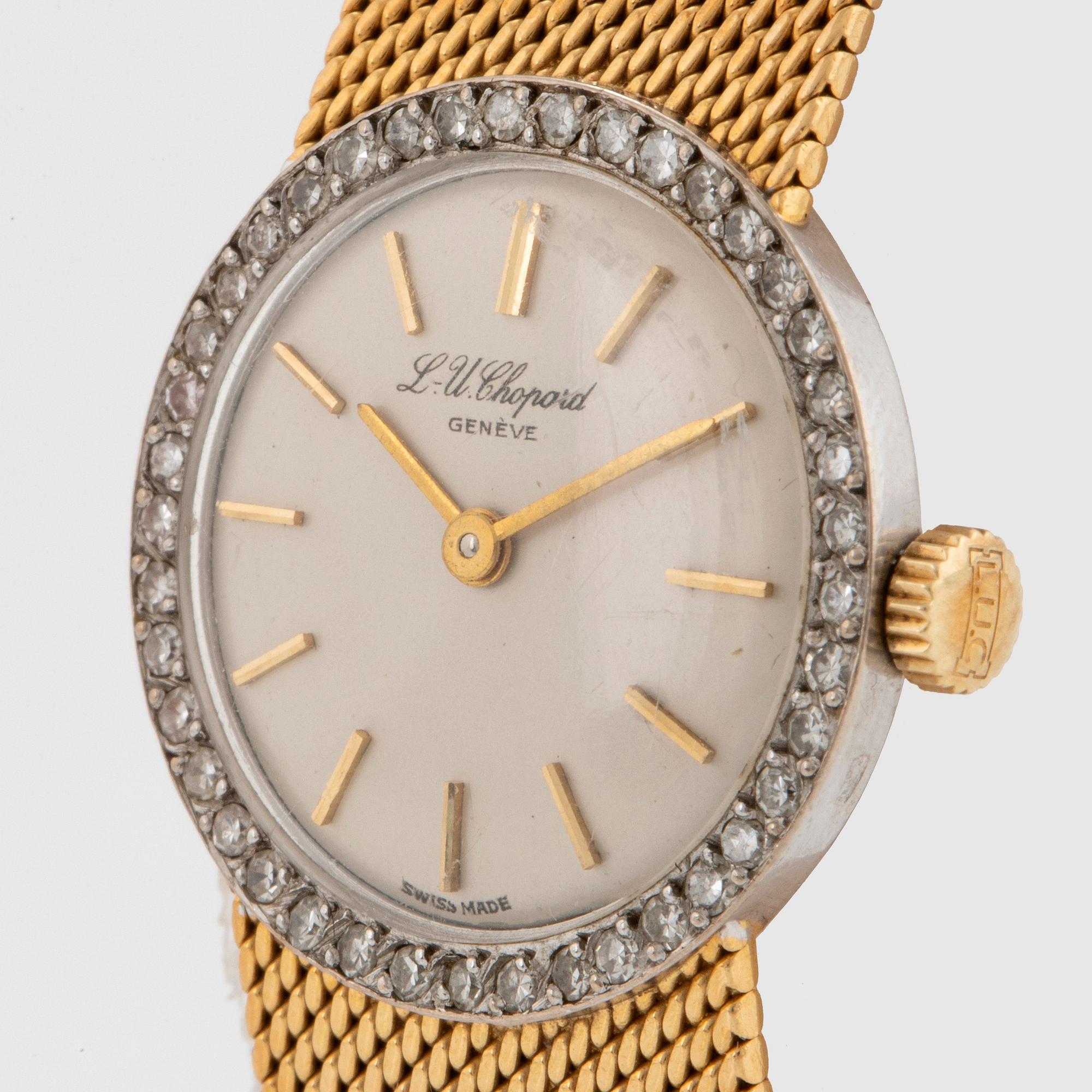A Chopard wrist watch in 18K gold set with eight-cut diamonds.