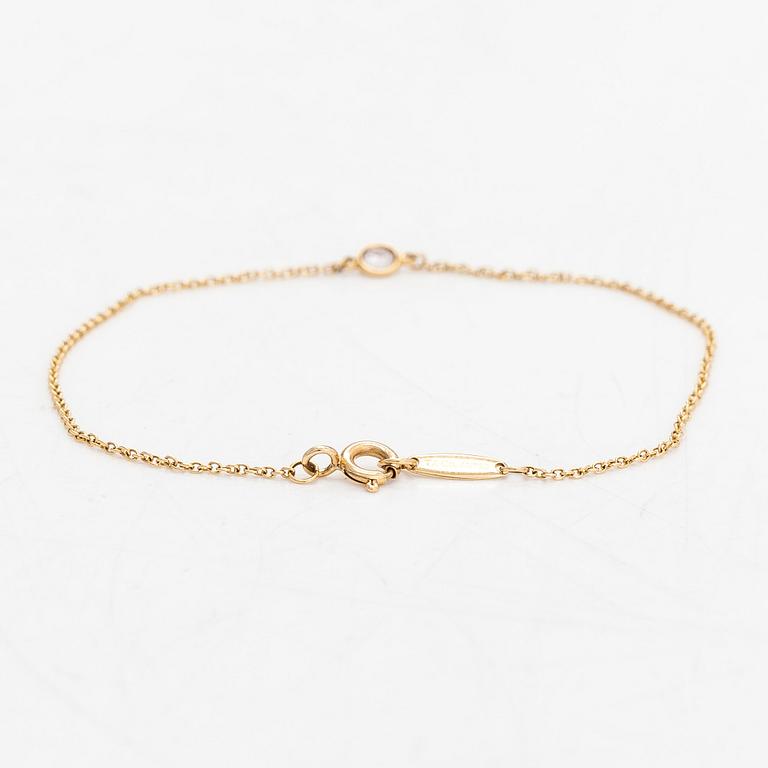 Tiffany & Co, Elsa Peretti, armband, "Diamonds by the Yard", 18K guld med en diamant ca 0.08 ct.