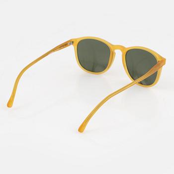 Illesteva, a pair of yellow sunglasses.