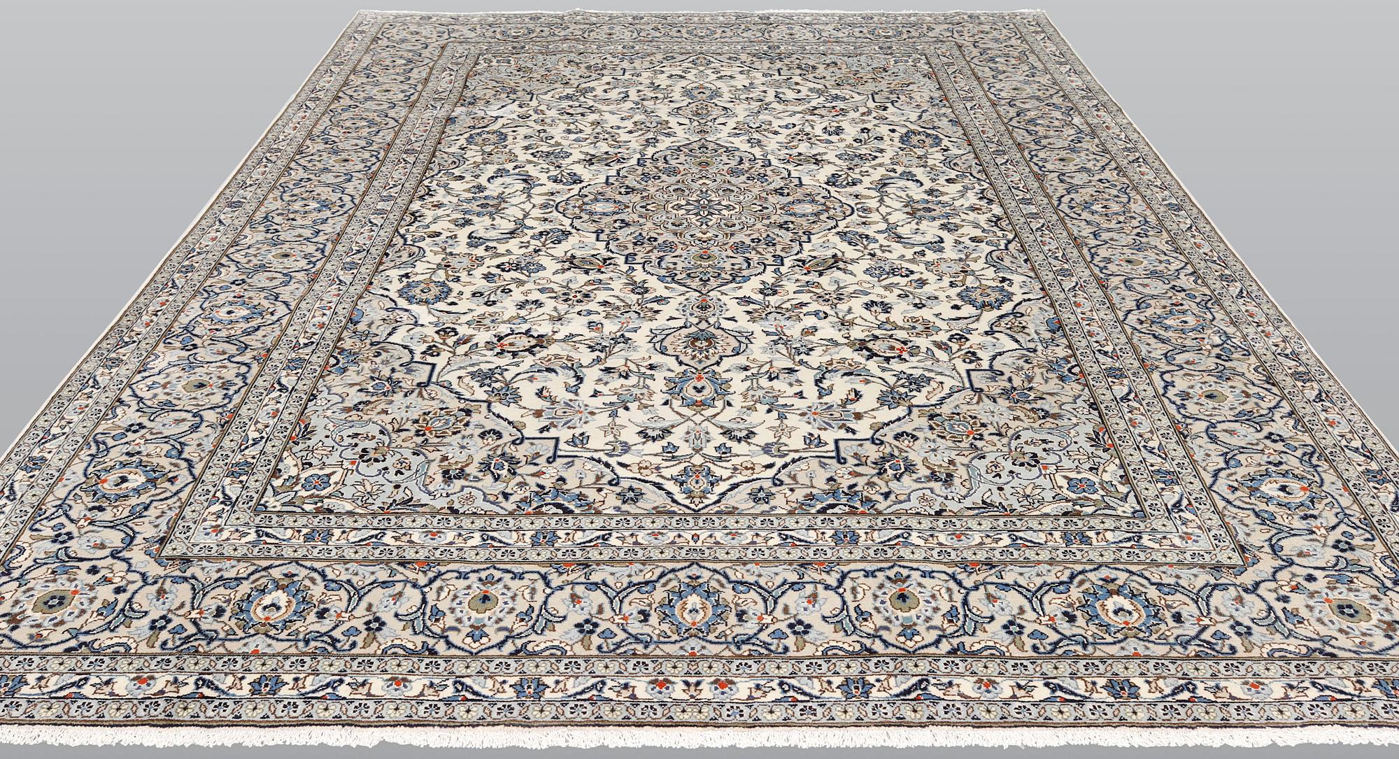 A Kashan carpet, ca 346 x 242 cm.